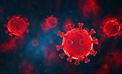 Closeup of red-coloured COVID-19 virus